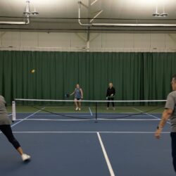 Women playing Pickleball